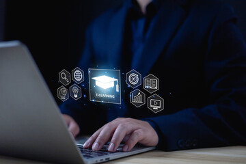 E-learning concept, Businessman showing icons in front of laptop. Learning online educate technology provides easy access, Learning through online greater enhance. training digital online