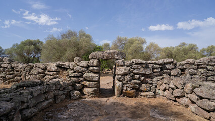 Remains of prehistoric stone huts in the Nuragic village of Serra Orrios, Sardinia