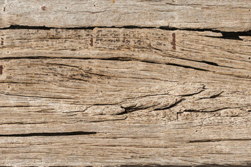 old boards cracked horizontally with nails