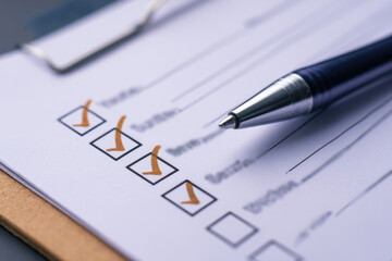 Survey form, check marks on checklist, document control, filling online form and answering questions, business project concept