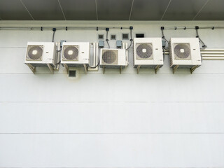 Air Conditioner Compressors Behind Train Power Control Building.