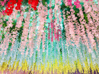 Vibrant Artificial Flower Decor at Temple Archway.