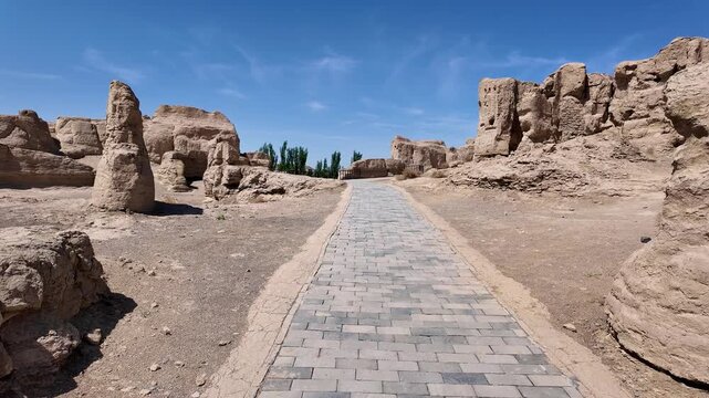 Turpan, China: Point of view of a walk along the path through the ruins of the Jiaohe ancient city in Turfan, Xinjiang in China