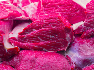 counters with beef meat in a large plan, large pieces