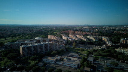 A park in the eastern part of Rome, a landscape that blends the greenery of the trees with the popular buildings.