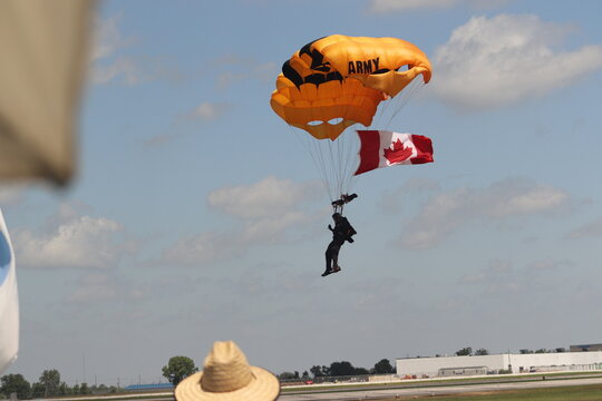 Parachuting soldier landing