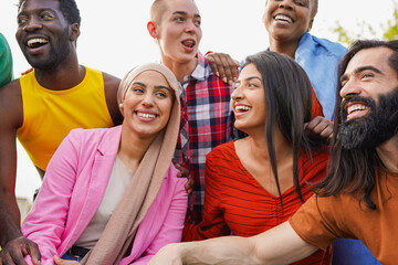 Group of multiracial young people having fun together at city park - Party, summer and lifestyle...