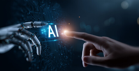 A human hand and robot finger touch on the background of digital technology, with an AI interface in between them displaying "AI " text