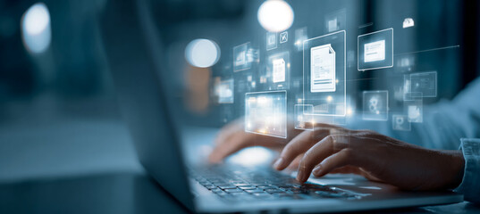 Person types on laptop with floating data icons. Digital transformation, database management concept for marketing, design, editorial, or web.