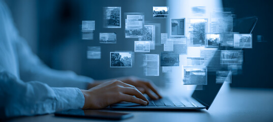 Woman types on laptop; images float, concept for design, marketing, web use, monochrome tone.