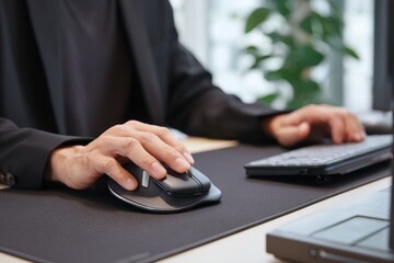 Person using a computer mouse