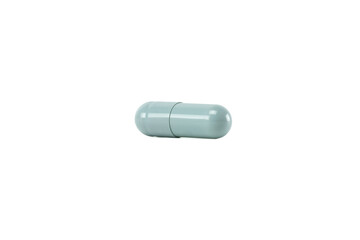Light blue pill or medical capsule for healthcare and treatment. A single pharmacy drug, vitamin, or supplement isolated on white background with clipping path.