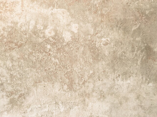 Distressed beige texture with light and dark variations resembling aged concrete or plaster, ideal...