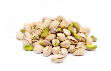Heap of tasty pistachio nuts isolated on white
