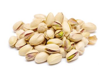 Heap of tasty pistachio nuts isolated on white
