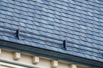 Snow Guard System on Asphalt Shingle Roof in Winter Climate