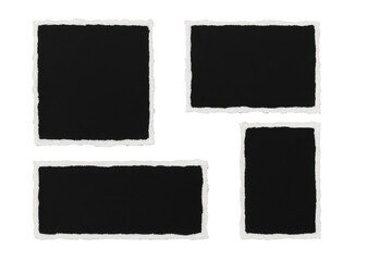 Four black squares with white borders. The squares are torn and ripped
