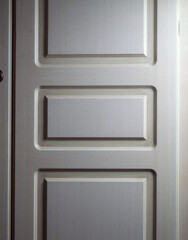 Close up of a cupboard door with decoration