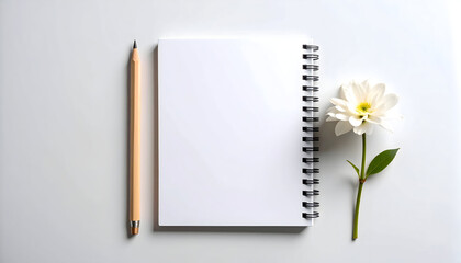 White Notepad Pencil and Flower Flatlay