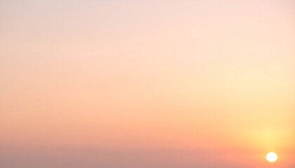 Obraz premium Soft Sunrise Sky with Pink and Amber Hues Minimalist Blurred Background and Gradual Color Transition