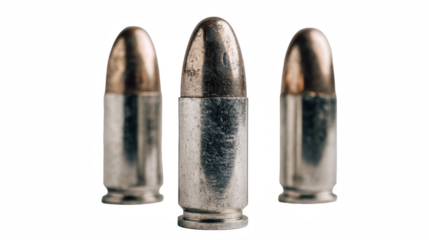 Three metallic bullets are arranged closely together against a clean transparent background