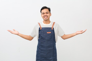 Friendly asian cafe employee with arms wide open inviting people. Isolated on white background