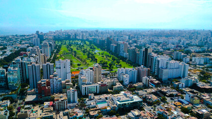Aereal view of San Isidro district with a clear view of the golf club and luxury buildings.