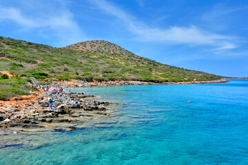 A popular tourist beach of Crete with turquoise water.  Kolokitha beach, peninsula Kalydon, Greece.