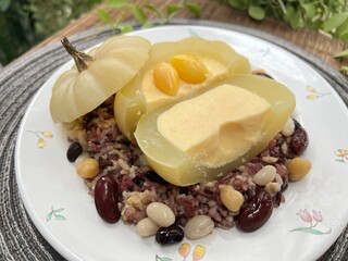 Mini pumpkin stuffed with steamed egg and ginkgo, served with brown rice mixed bean.