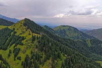 Ile-Alatau National Park. Mountainous area with different vegetation near Almaty. The Tian Shan Mountains.