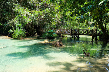 Most magnificent and breathtaking nature of Kuang Si waterfall and cascade and its green, emerald...