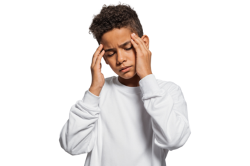 Young boy looking distressed, holds his head with both hands, conveying a headache or discomfort, isolated on tramsparent background