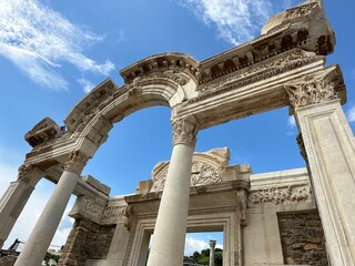 Closeup of Roman ruins in Ephesus, Turkey with blue sky and clouds