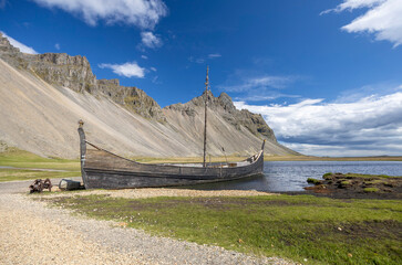 viking longboat at the viking village of Vestrahorn on a sunny summer day, Iceland