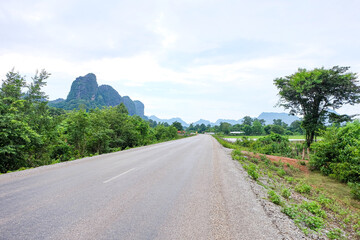 Beautiful green nature, trees in the water and mountain in the south of Laos, Khammuane province 