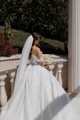 Bridal portrait at a garden venue during a sunny afternoon
