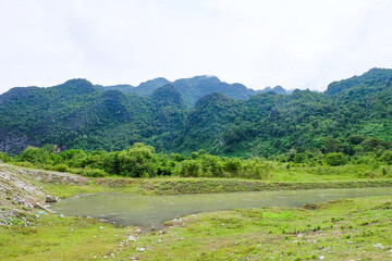 River flow and the fresh green mountain in the south of Laos 
