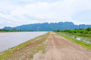 River flow and the fresh green mountain in the south of Laos 