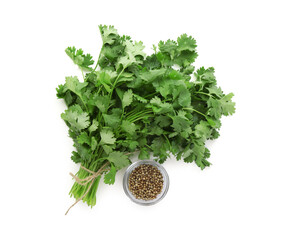 Fresh cilantro and coriander seeds isolated on white, top view