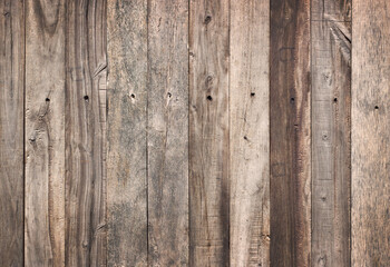 Abstract Rustic aged wood planks showcase a rich, weathered texture, perfect as a versatile background for photography