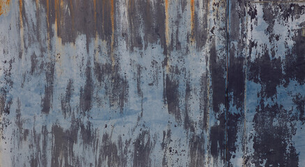 Gritty, distressed paint peeling from old metal surface. A weathered, industrial background with rich texture and character