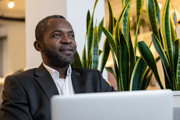 African american businessman working in the office and looking busy