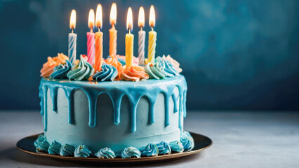 Whipped cream birthday cake in pastel blue, topped with soft multicolor candles, sweet and festive