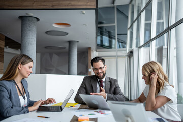 Business team discussing strategy during office meeting