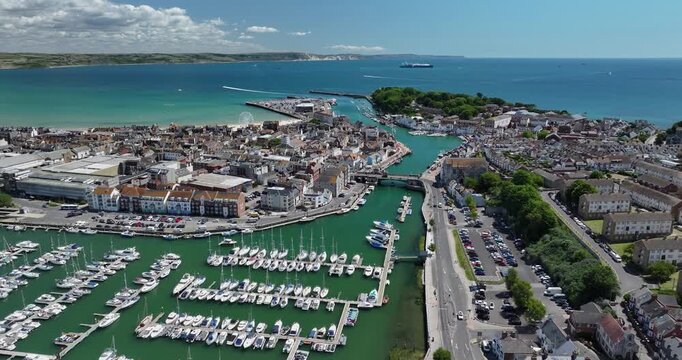 Aerial View of Sunny Town, Port, Harbour, Bridge, Bay and Beach in the Summer