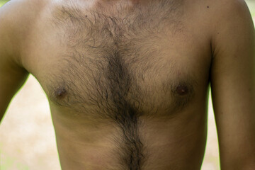 a fair-skinned chest center in the navel