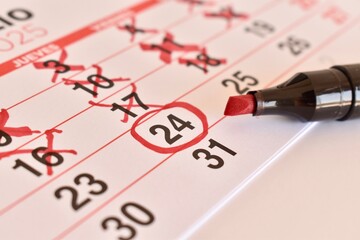 Countdown to a big day marked on a calendar with a colorful marker. Important date reminder and daily planning concept.