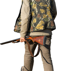 Mature man hunter with gun while walking on field with your dogs