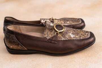Pair of leather shoes. Brown classic moccasins. Loafers footwear closeup