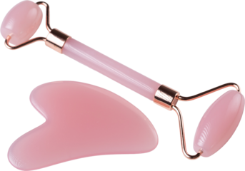 Pink Gua Sha massage tool on a white background, close-up. Rose Quartz jade roller.